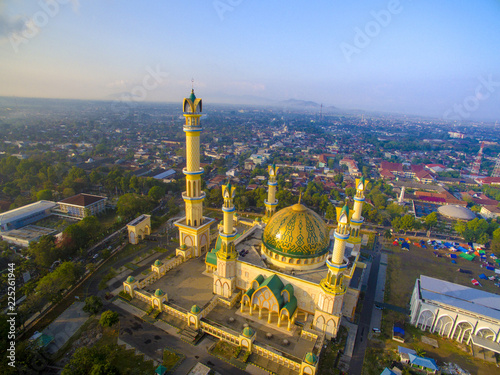 Panorama Masjid Islamic Center with blue background, it located in the city of Mataram. It is the one of the largest mosque in the world © Ara Creative
