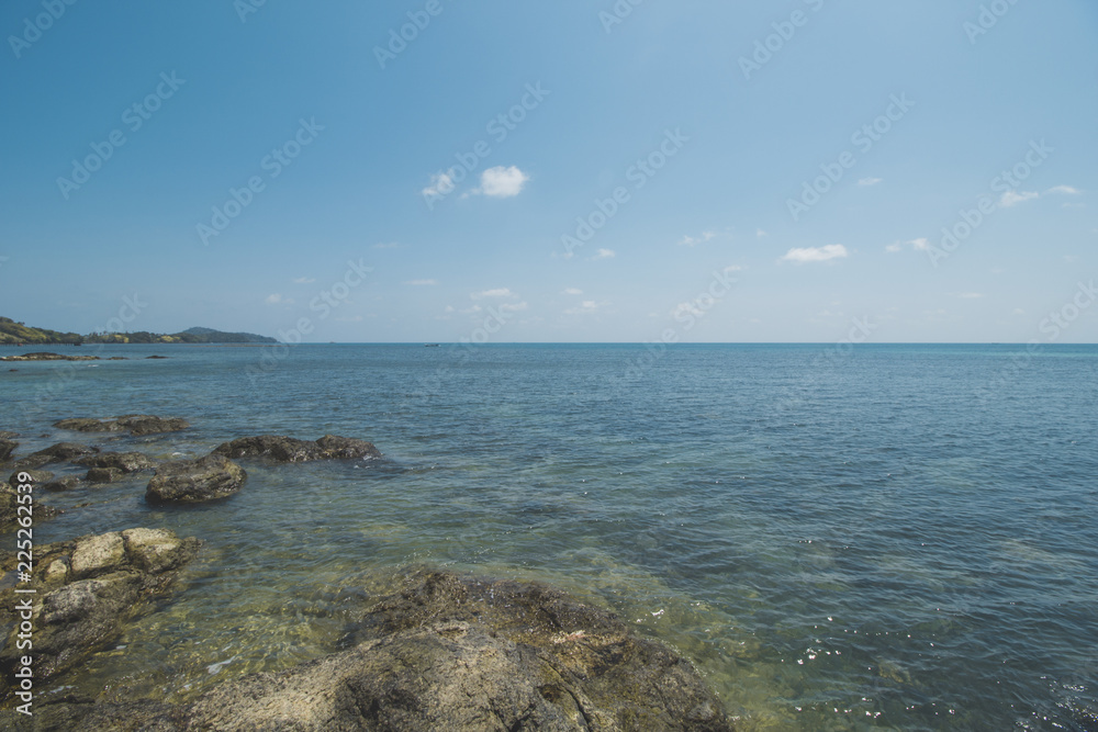 Beautiful Tropical Beach with Granite Rocks and Blue Sky