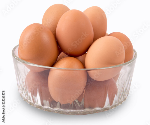 eggs in a glass bowl with white background