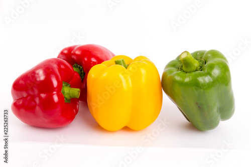 Yellow, Red, and Green pepper isolated on white background