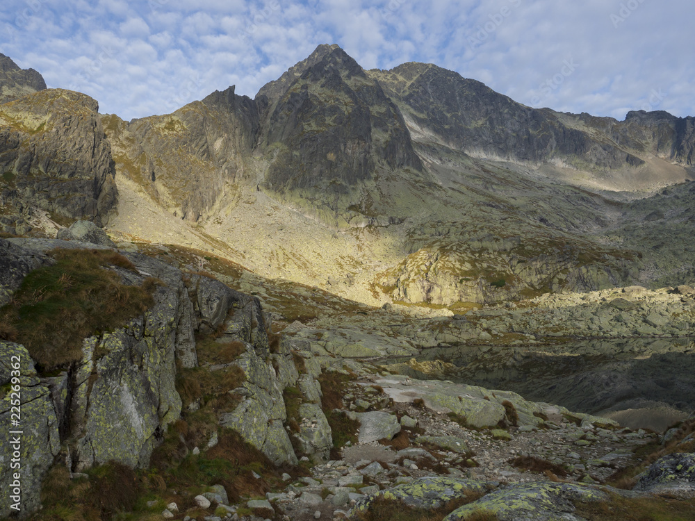 view on mountain lake Prostredne Spisske pleso at the end of the hiking route to the Teryho Chata mountain shelter in the High Tatras in Slovakia