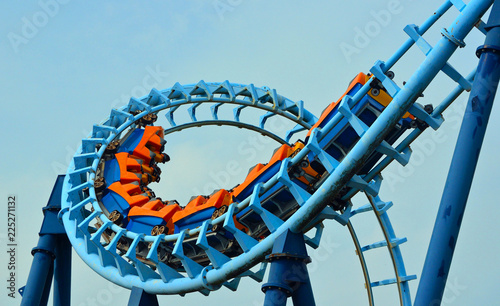  Roller coaster  ride filled  with thrill seekers doing 