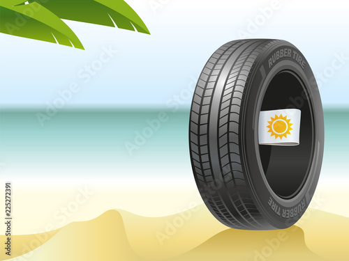 The summer tire on the hot beach.The summer tire on the hot beach is ready to tests by summer heat.