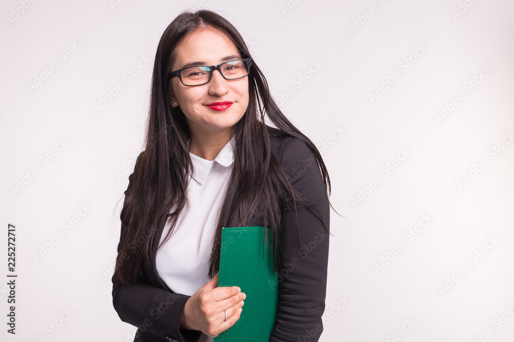 Business, work and people concept - Asian young woman holding a folder