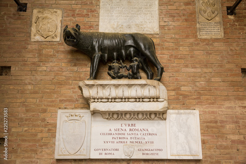 Sculpture of she-wolf suckling the infants Romulus and Remus, the symbol of Siena in Tuscany
