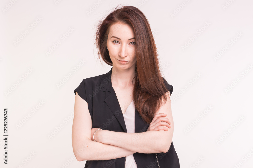 Young Asian pretty woman crossed her arms on white background Young Asian pretty woman crossed her arms on white background