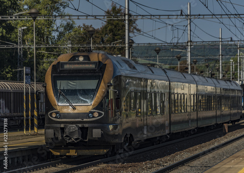 Obraz na płótnie Black gold train in Zabreh station in summer day w salonie
