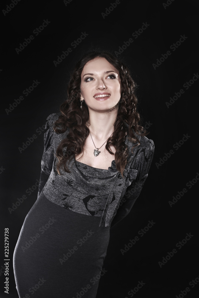 portrait of a smiling beautiful woman .isolated on black portrait of a smiling beautiful woman .isolated on black