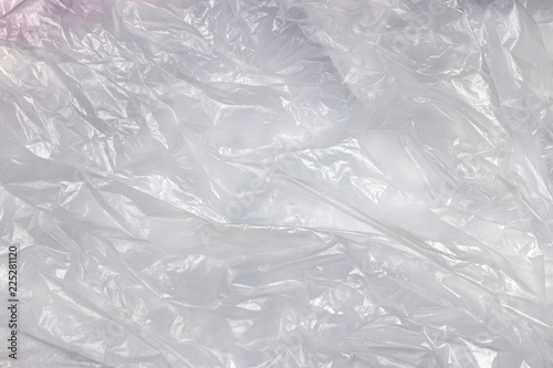 Plastic texture background. Abstract crumpled material. Transparent object wrinkled.