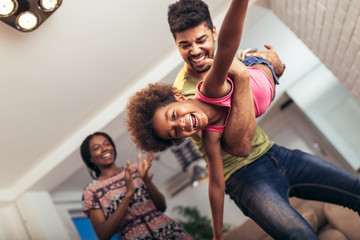 African american family spending time together at home. They are having fun