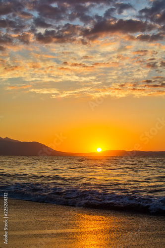 Early morning   dramatic sunrise over sea and mountain. Photographed in Asprovalta  Greece.