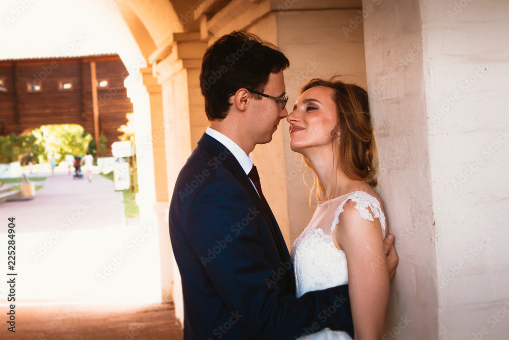 bride and groom on the background of the Kolomna Palace bride and groom on the background of the Kolomna Palace