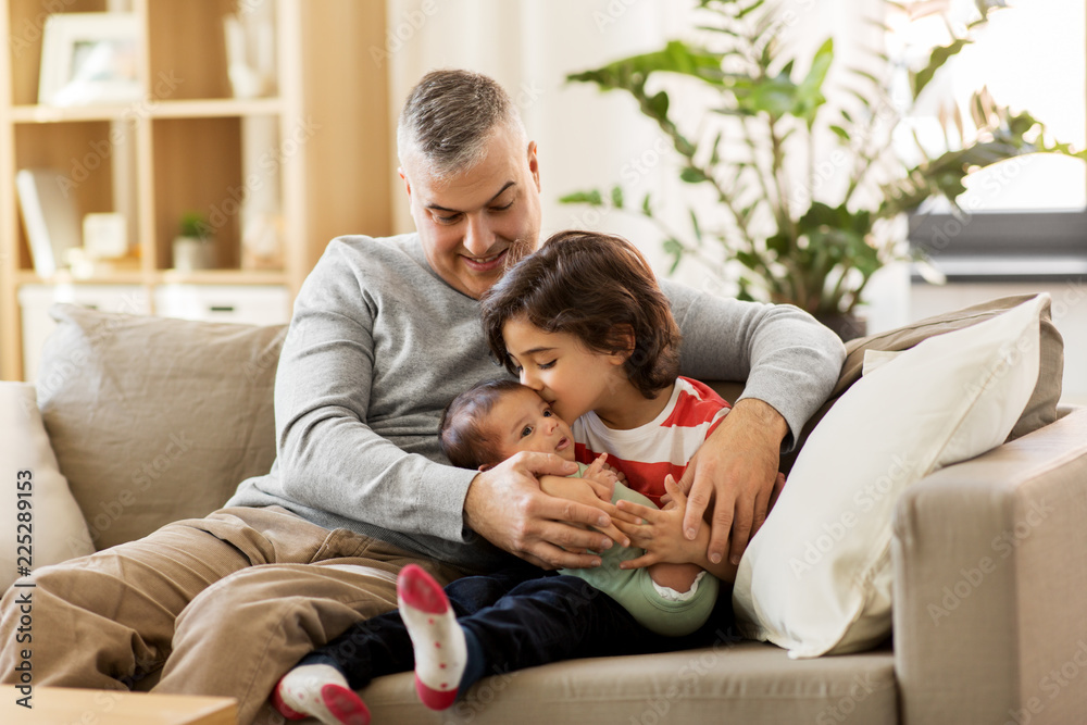 family, fatherhood and people concept - happy father with preteen and baby son at home family, fatherhood and people concept - happy father with preteen and baby son at home