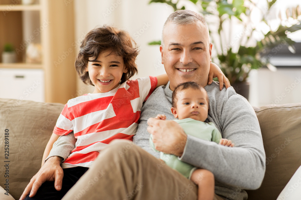family, fatherhood and people concept - happy father with preteen and baby son at home family, fatherhood and people concept - happy father with preteen and baby son at home