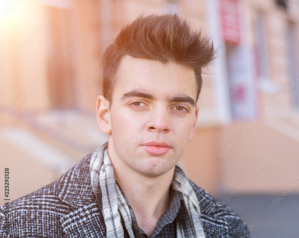 Fototapeta premium Portrait handsome man in city street