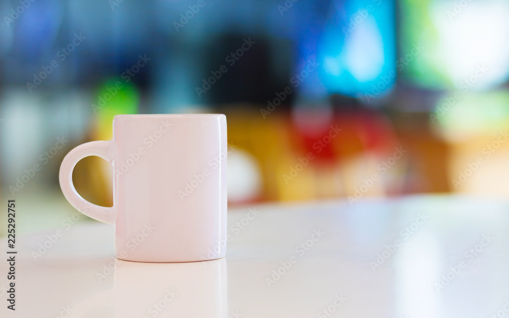 Blank mug on white table background and copyspace. Handle cup or ceramic for your design. Can put your text, image or logo. Blank mug on white table background and copyspace. Handle cup or ceramic for your design. Can put your text, image or logo.