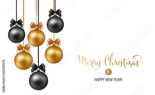 Christmas background with gold and black evening baubles