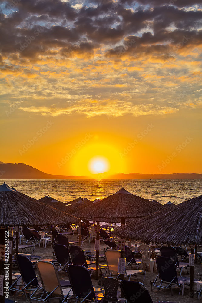 Fototapeta premium View of the sunrise through a local restaurant