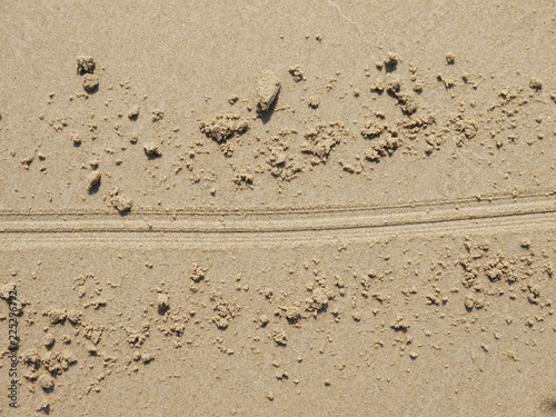 Texture of wheel track on the sand