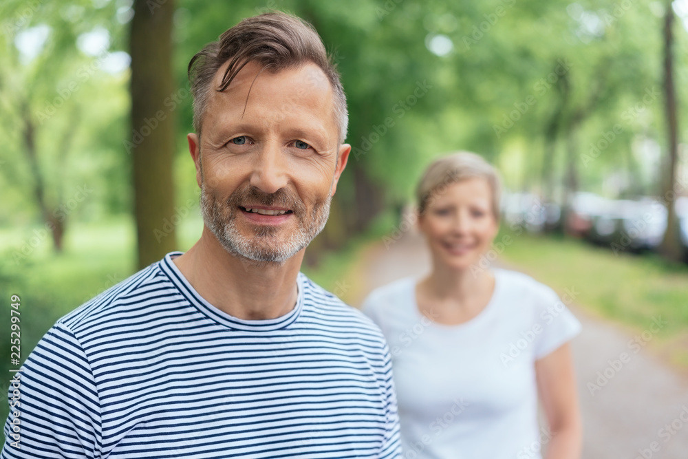 Portrait of a handsome middle-aged man smiling Portrait of a handsome middle-aged man smiling