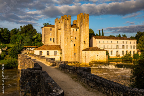Photography Moulin des Tours- fortified mill in Barbaste, France, at sunset