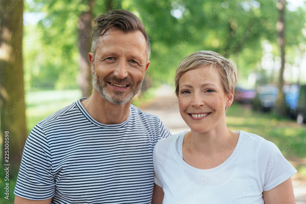 Portrait of a cheerful middle-age couple in love Portrait of a cheerful middle-age couple in love