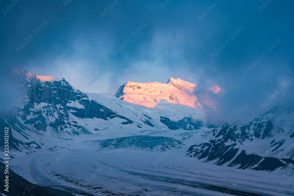 Obraz premium Scenic view of beautiful landscape of Swiss Alps with a majestic Glacier de Corbassiere, Switzerland.