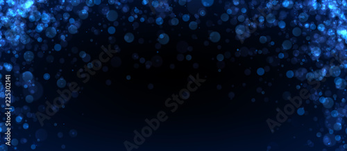 Blue abstract blurred background with bokeh effect.