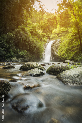 soft water of the stream in the natural park  Beautiful waterfall in rain forest.