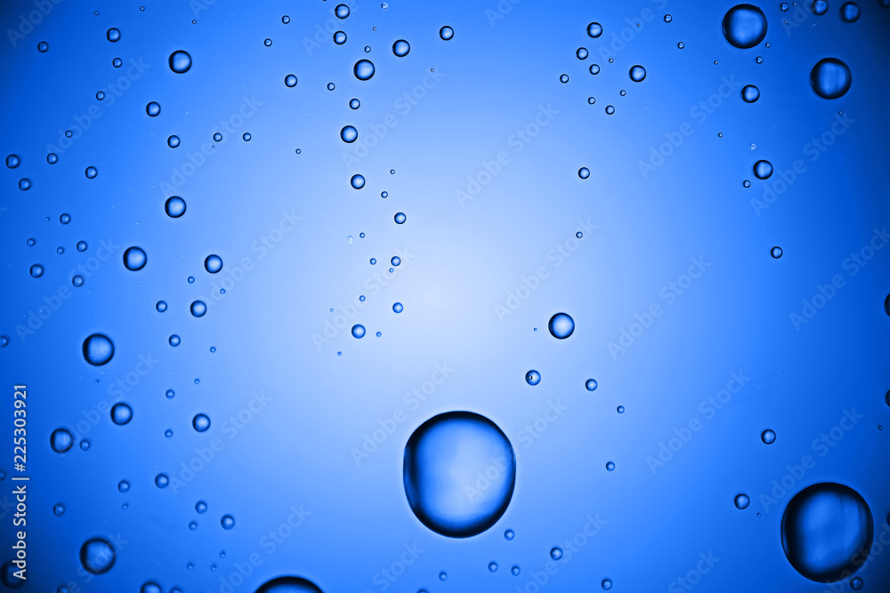 fresh drops background blue glass / wet rainy background, water drops transparent glass blue