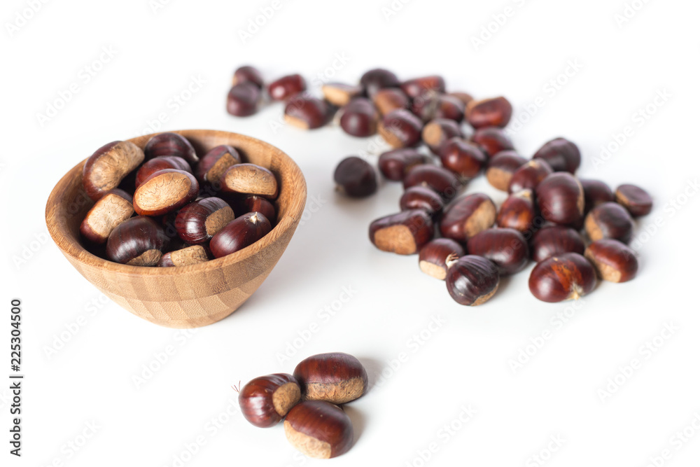pile of chestnuts in a wooden bowl isolated
pile of chestnuts in a wooden bowl isolated