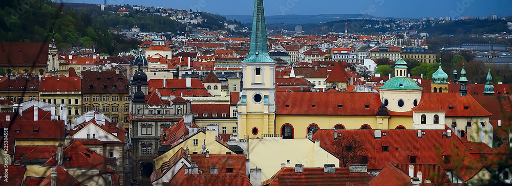narrow panorama of Prague horizontal / view of the capital of the czech republic, Prague castle with red roofs, tourist view, landscape in the czech republic