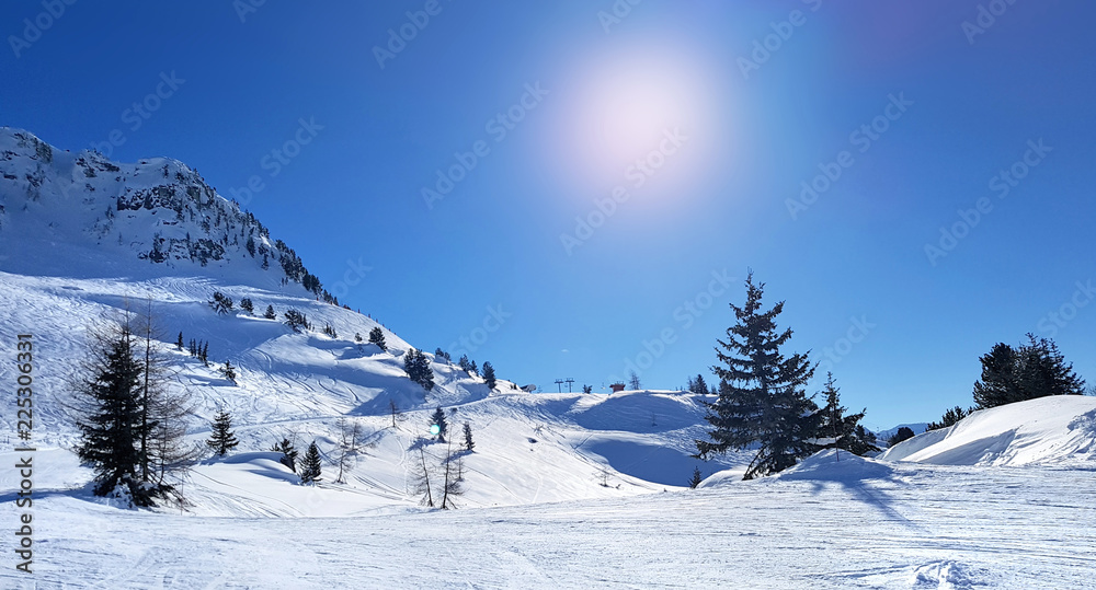 beautiful snowy montain under sunny blue sky