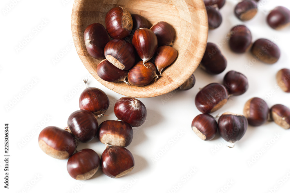 pile of chestnuts in a wooden bowl isolated
pile of chestnuts in a wooden bowl isolated