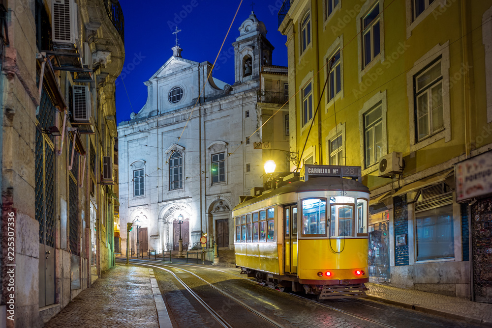 Fototapeta premium tram on line 28 in lisbon, portugal at night