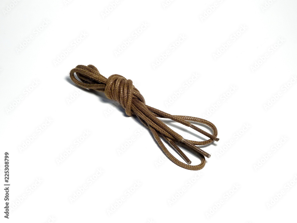 Brown laces on a white background Brown laces on a white background