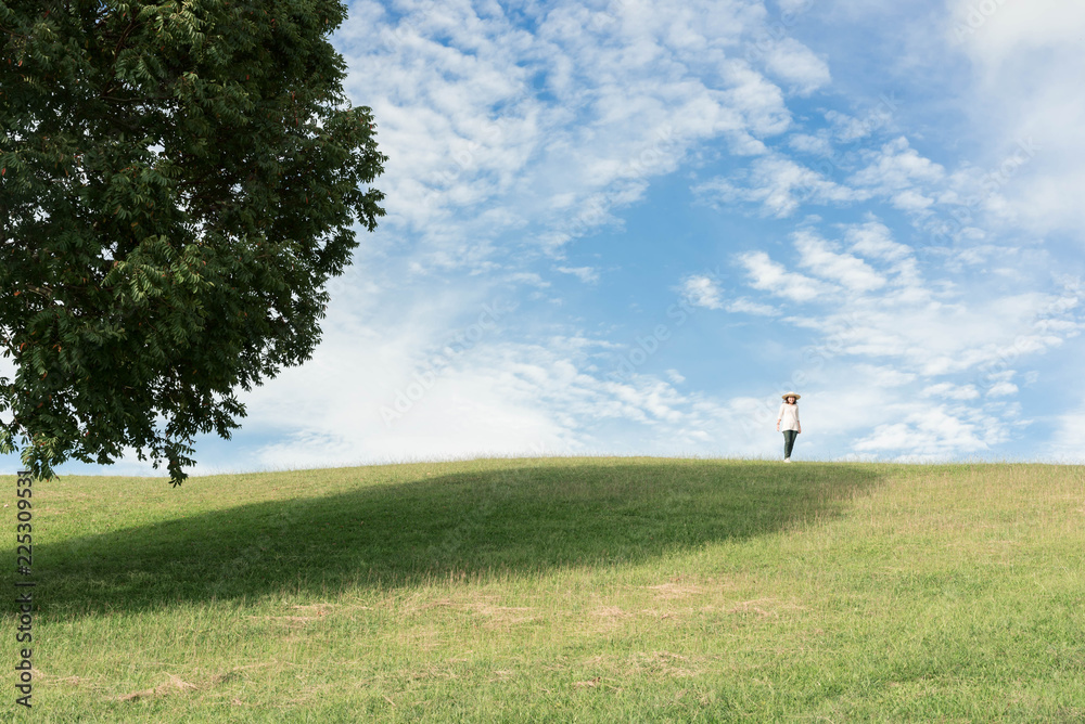 Woman standing on the mountain and looking beautiful sky. Woman standing on the mountain and looking beautiful sky.
