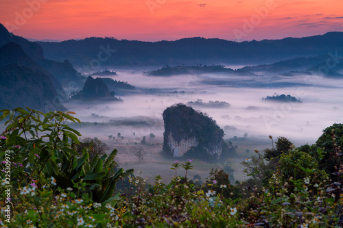 phulangka mountain with myst and sunrise in Phu Langka National Park, Payao Province, thailand photo