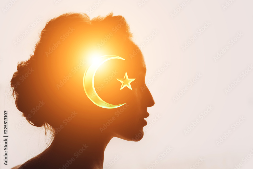 Symbol of Islam concept. Muslim woman silhouette. Moon and star.