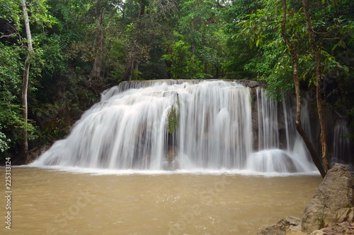 Scenic view of waterfall in the forest (place of fish),erawan waterfall national park,kanchanaburi,thailand. 