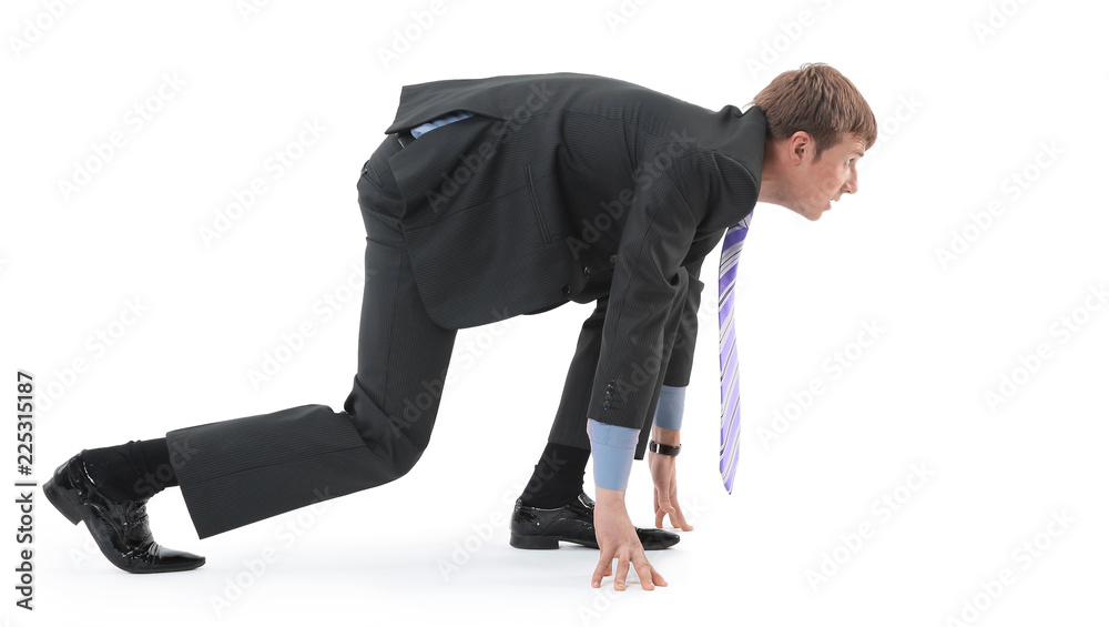 A young handsome businessman, dressed in a suit, began to prepar A young handsome businessman, dressed in a suit, began to prepar