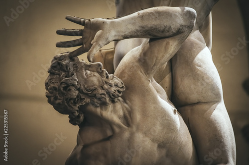 Ratto delle Sabine is a statue, by Giambologna 1574, in the Loggia dei Lanzi in Piazza della Signoria in Florence. photo