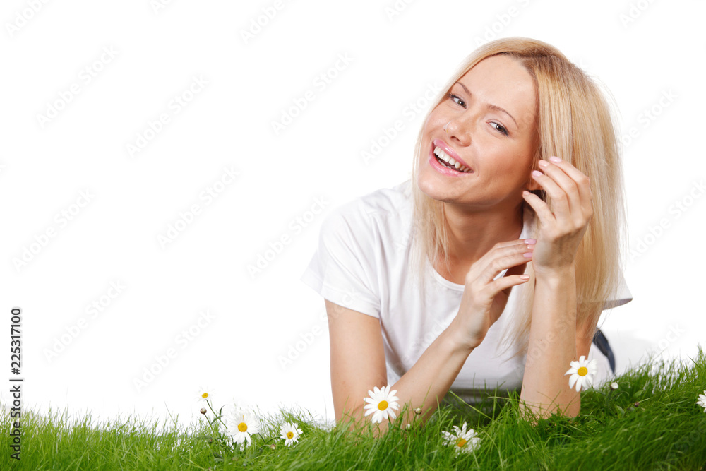 Woman on grass with flowers Woman on grass with flowers