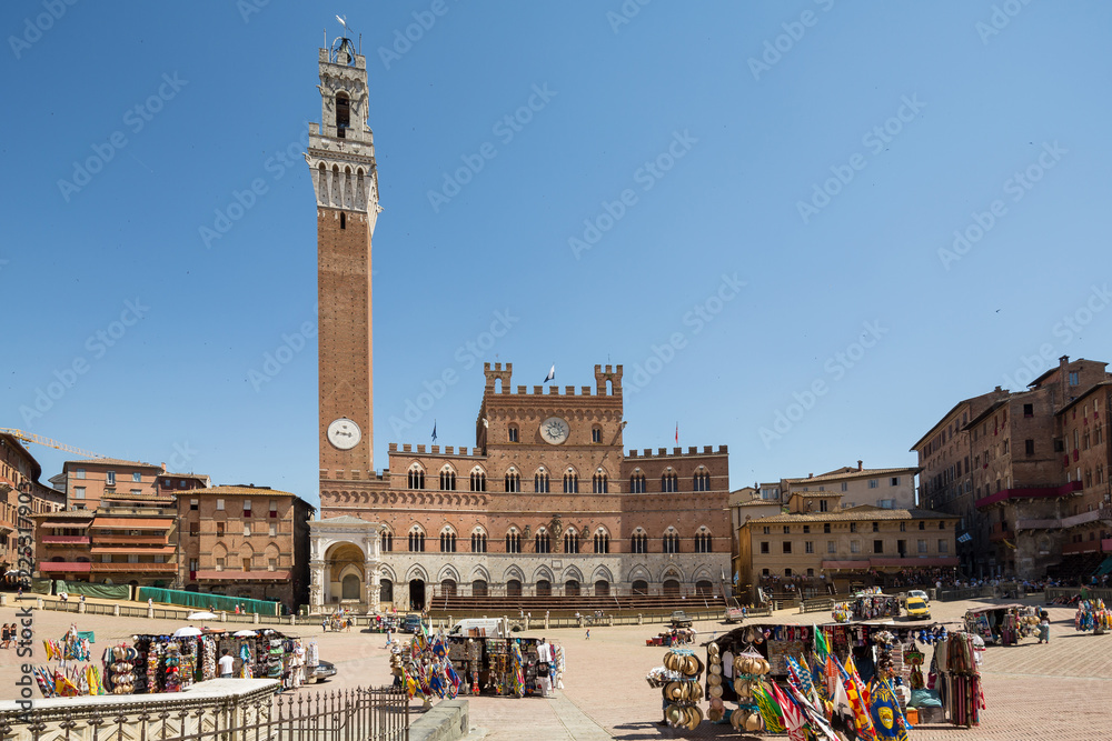View of the  Palazzo Publico palace and the Piazza del Campo being prepared for the famous palio horse race