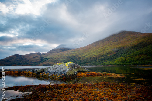 View of Dramatic Cloud Capped Hills Across Loch Ailort at Sunrise, HIghlands, Scotland, UK
