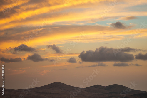 view of hills at sunset