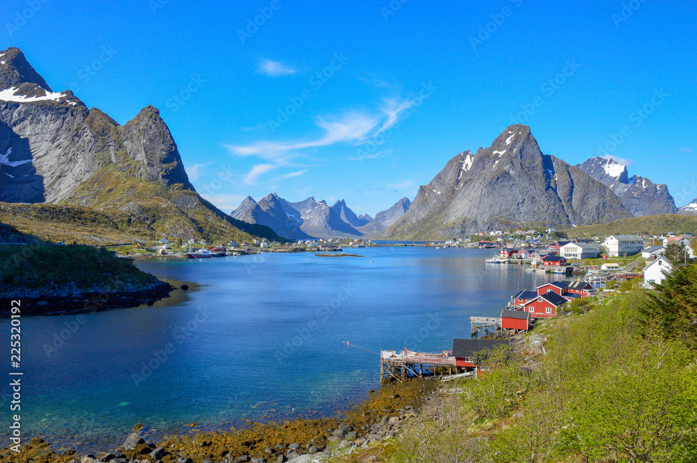 Fototapeta premium Small lofoten village lost in the middle of a fjord, Norwey.