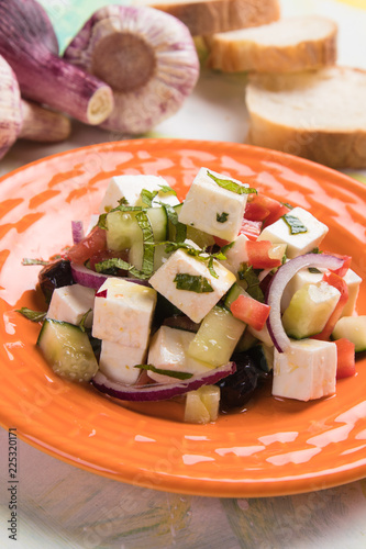 Greek salad with feta cheese photo