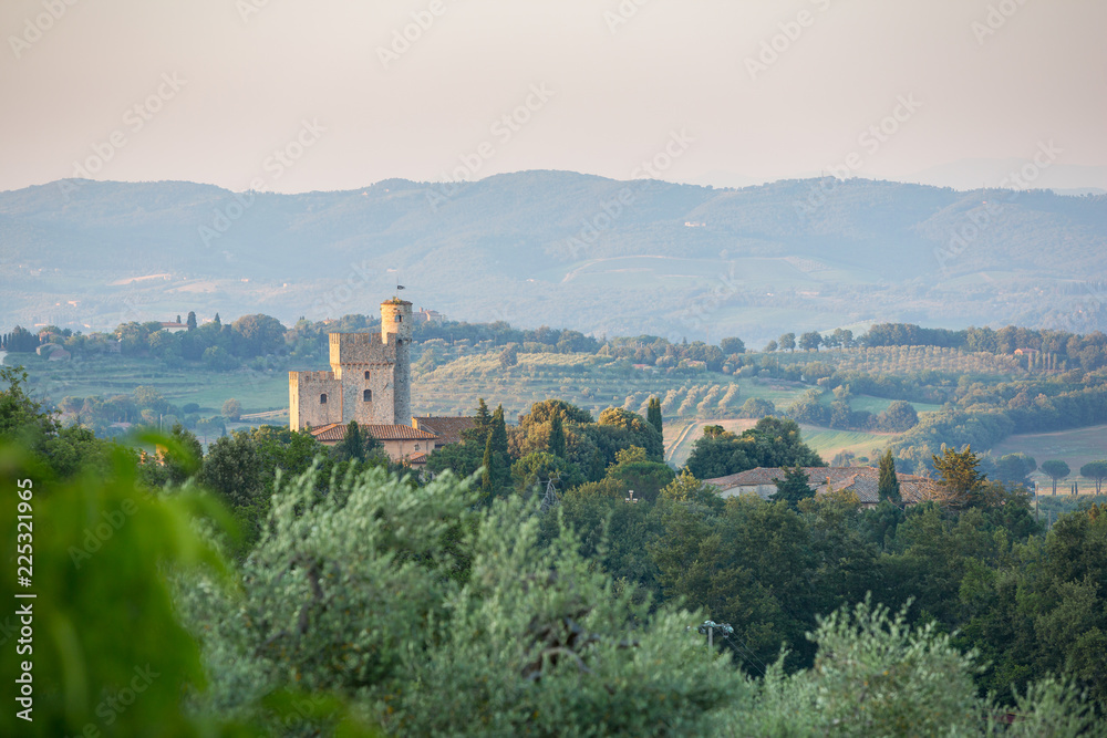 Typical Tuscan house and square tower amid the rolling hills; Tuscany Italy