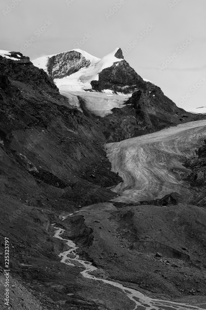 B&W Adlerhorn in clear sky with glaciers Adlergletscher, Findelgletscher and glacier stream